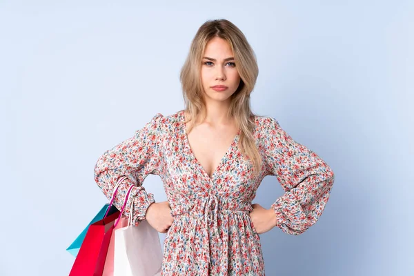 Teenager Russian Girl Shopping Bag Isolated Blue Background Angry — Foto Stock