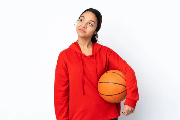 Young Woman Playing Basketball Isolated White Background Having Doubts While — Foto Stock