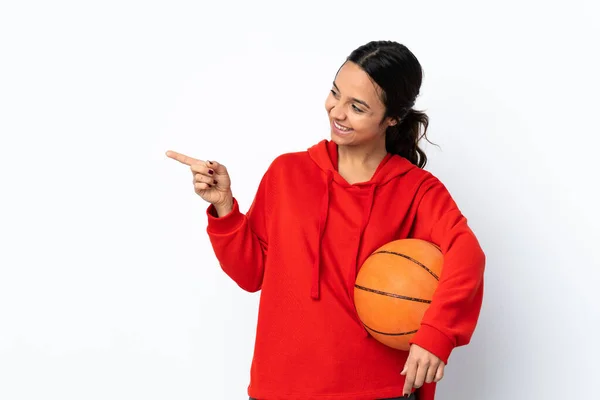 Young Woman Playing Basketball Isolated White Background Pointing Finger Side — Stok Foto