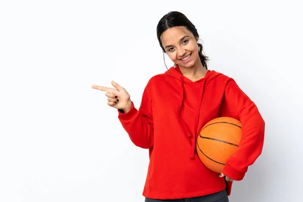 Young Woman Playing Basketball Isolated White Background Pointing Finger Laterals — Stok fotoğraf