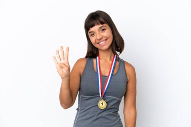 Young mixed race woman with medals isolated on white background happy and counting four with fingers