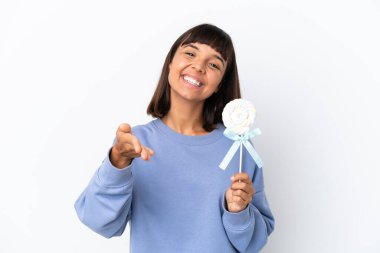 Young mixed race woman holding a lollipop isolated on white background shaking hands for closing a good deal