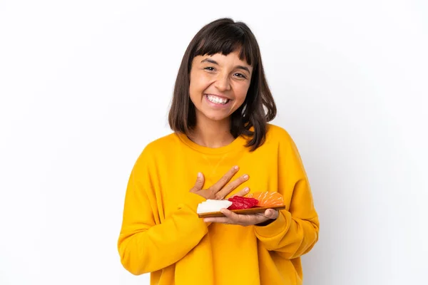 Young Mixed Race Woman Holding Sashimi Isolated White Background Smiling — Stockfoto