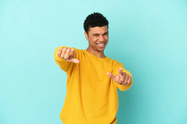 Young African American Man Isolated Blue Background Pointing Front Happy — Fotografia de Stock