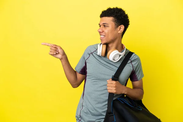 Young Sport African American Man Sport Bag Isolated Yellow Background — Fotografia de Stock