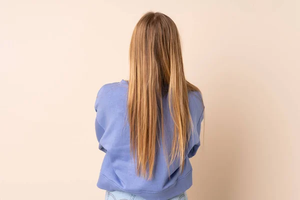 Teenager Ukrainian Girl Isolated Beige Background Back Position — Stockfoto