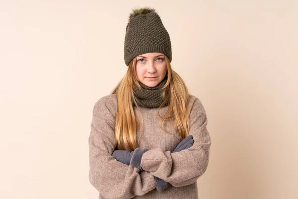 Teenager Ukrainian Girl Winter Hat Isolated Beige Background Keeping Arms — Fotografia de Stock