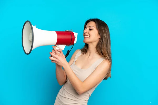 Young Caucasian Woman Isolated Blue Background Shouting Megaphone Announce Something — Stock Photo, Image