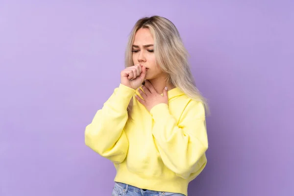 Teenager Girl Wearing Yellow Sweatshirt Isolated Purple Background Suffering Cough — стоковое фото