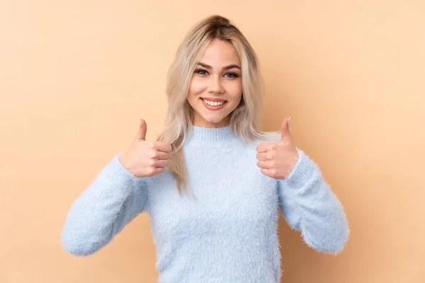 Adolescente Chica Sobre Aislado Fondo Dando Pulgar Hacia Arriba Gesto — Foto de Stock