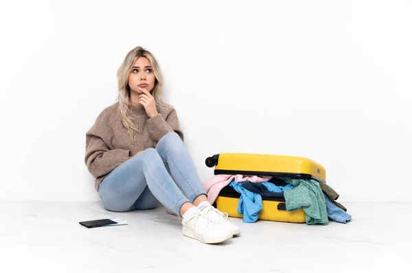 Teenager Blonde Girl Suitcase Full Clothes Sitting Floor Having Doubts — Foto Stock