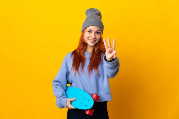 Teenager Russian Skater Girl Isolated Yellow Background Happy Counting Three — Stockfoto