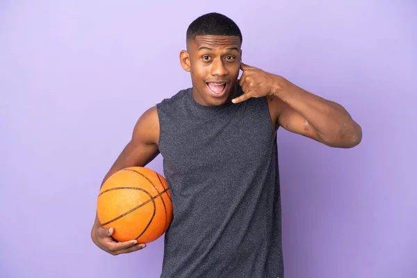 Young Basketball Latin Player Man Isolated Purple Background Making Phone — Fotografia de Stock