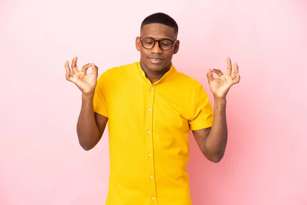 Young Latin Man Isolated Pink Background Zen Pose — 图库照片