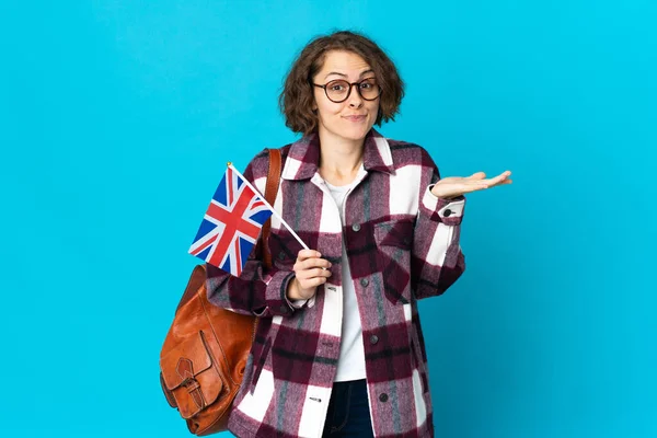 Young English Woman Holding United Kingdom Flag Isolated Blue Background — Fotografia de Stock