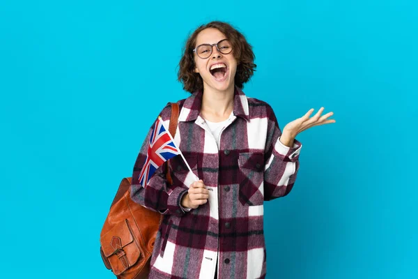 Young English Woman Holding United Kingdom Flag Isolated Blue Background — Fotografia de Stock