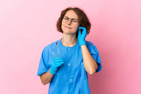 Woman English Dentist Holding Tools Isolated Pink Background Having Doubts — 图库照片