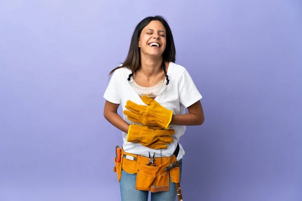 Young Electrician Woman Isolated Purple Background Smiling Lot — Stockfoto