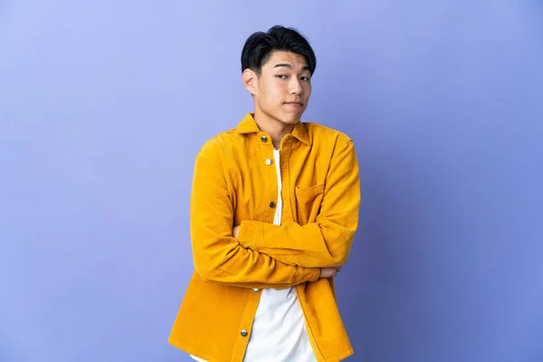 Young Chinese Man Isolated Purple Background Making Doubts Gesture While — ストック写真