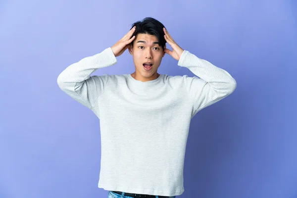 Young Chinese Man Isolated Purple Background Surprise Expression — Stok fotoğraf