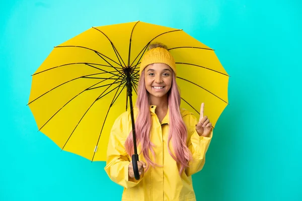 Young Mixed Race Woman Rainproof Coat Umbrella Showing Lifting Finger — Stockfoto