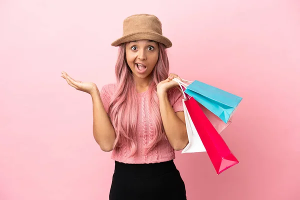 Young Mixed Race Woman Shopping Bag Isolated Pink Background Shocked — Stock Fotó