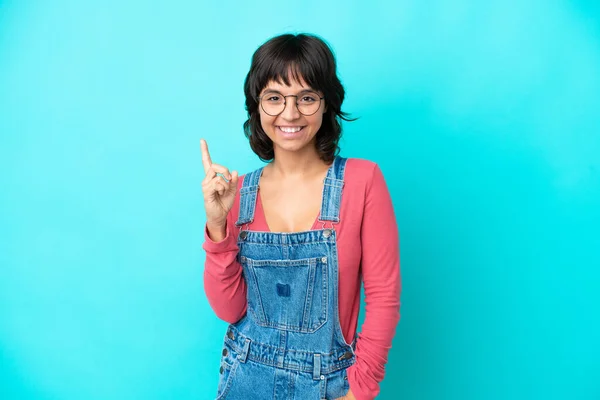 Young Woman Overalls Isolated Background Pointing Great Idea — Fotografia de Stock