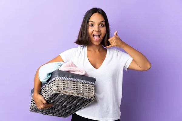 Young Latin Woman Holding Clothes Basket Isolated Purple Background Making — Stock Fotó