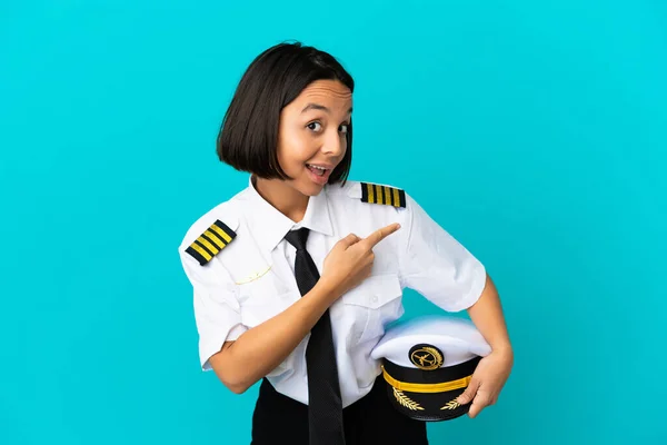 Young Airplane Pilot Isolated Blue Background Pointing Side Present Product — Foto Stock