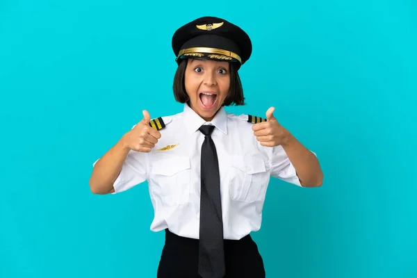 Young Airplane Pilot Isolated Blue Background Giving Thumbs Gesture — Zdjęcie stockowe