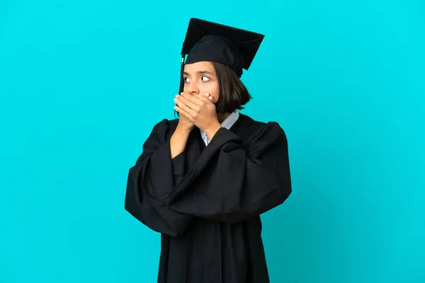 Young University Graduate Girl Isolated Blue Background Covering Mouth Looking — Stock Photo, Image