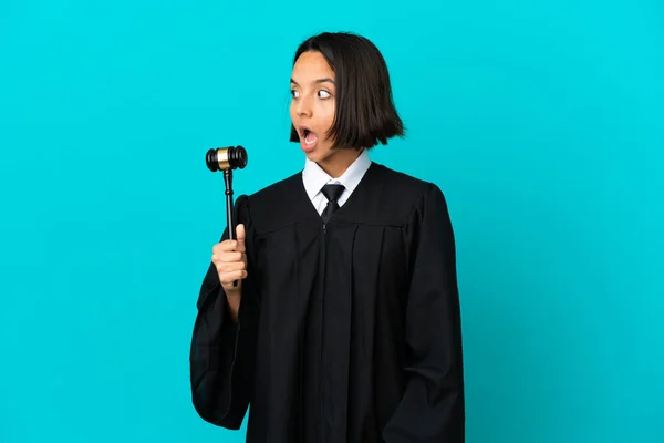 Judge Isolated Blue Background Doing Surprise Gesture While Looking Side — Photo