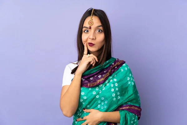 Young Indian Woman Isolated Purple Background Thinking — стоковое фото