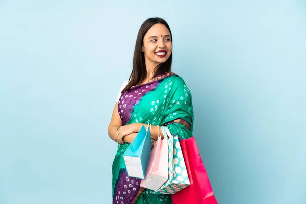Young Indian Woman Shopping Bags Arms Crossed Happy — стокове фото