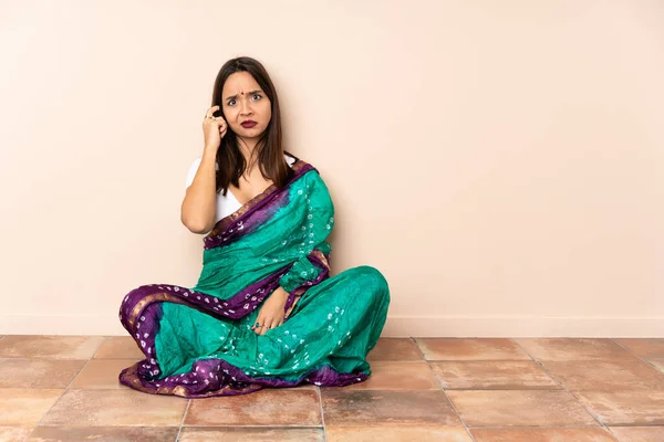 Young Indian Woman Sitting Floor Thinking Idea — Zdjęcie stockowe