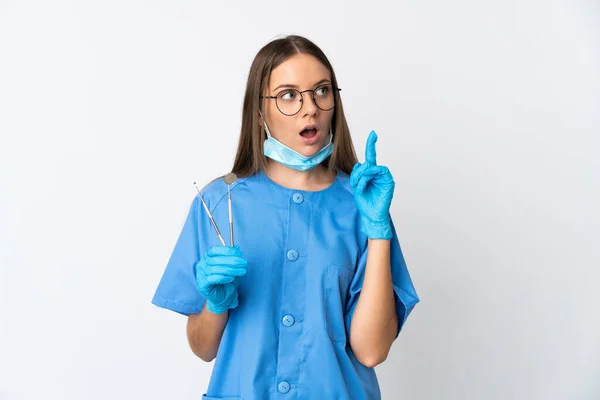 Lithuanian Woman Dentist Holding Tools Isolated Background Thinking Idea Pointing — Stock Photo, Image