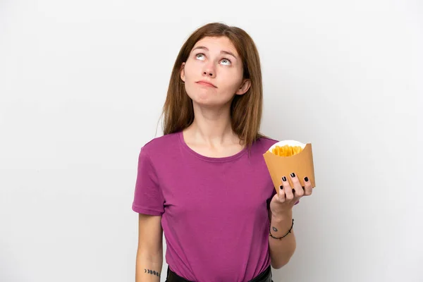 Young English Woman Holding Fried Chips Isolated White Background Looking — Fotografia de Stock