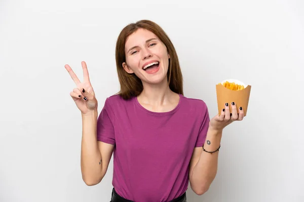 Jovem Inglesa Segurando Batatas Fritas Isoladas Fundo Branco Sorrindo Mostrando — Fotografia de Stock