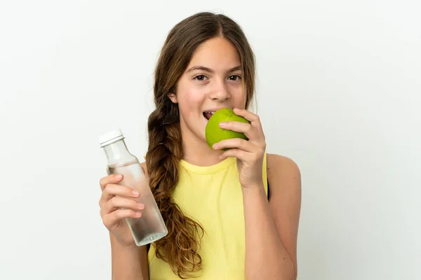 Little Caucasian Girl Isolated White Background Bottle Water Eating Apple — Stock Fotó