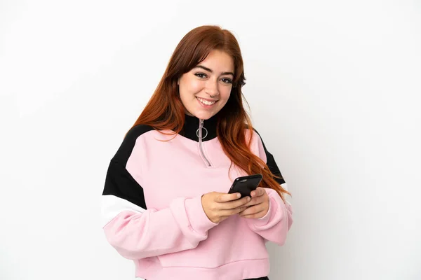 Young Redhead Woman Isolated White Background Sending Message Mobile — Stockfoto