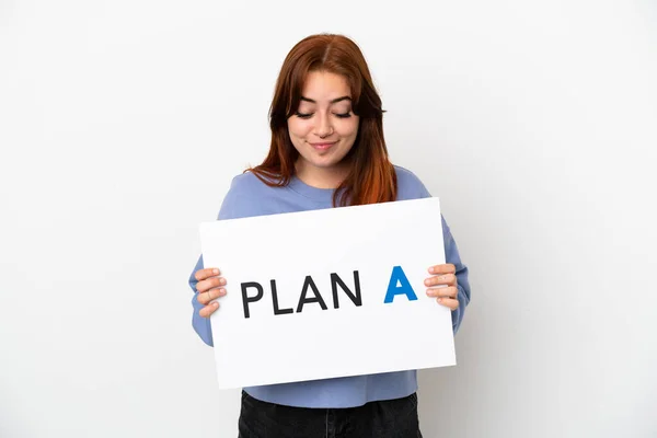 Young Redhead Woman Isolated White Background Holding Placard Message Plan — Zdjęcie stockowe