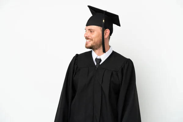 Young University Brazilian Graduate Isolated White Background Looking Side — Stockfoto