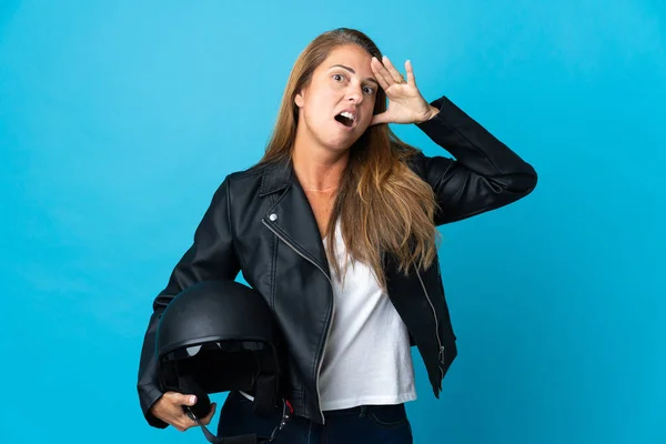 Middle Age Woman Holding Motorcycle Helmet Isolated Blue Background Doing — Stock Photo, Image