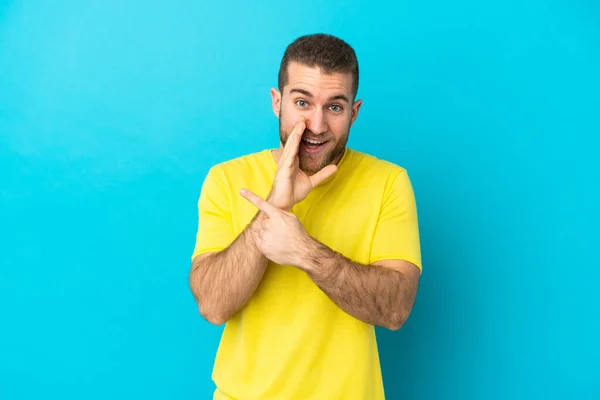 Young Handsome Caucasian Man Isolated Blue Background Pointing Side Present — Stock Photo, Image