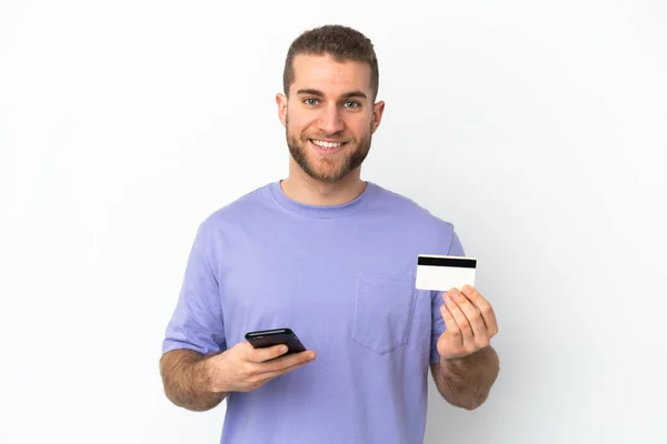 Young Handsome Caucasian Man Isolated White Background Buying Mobile Credit — Stock fotografie
