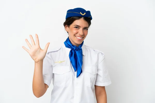 Stewardessa Samolot Kaukaska Kobieta Odizolowany Białym Tle Licząc Pięć Palcami — Zdjęcie stockowe