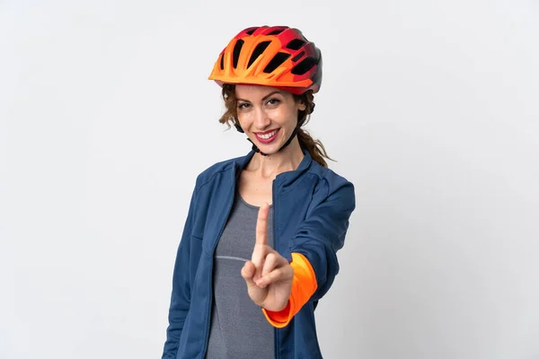 Junge Radfahrerin Isoliert Auf Weißem Hintergrund Zeigt Und Hebt Einen — Stockfoto
