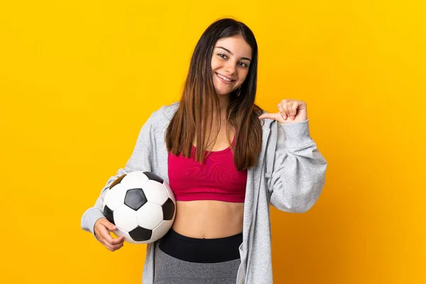 Young Caucasian Woman Isolated Yellow Background Soccer Ball Proud Himself — Zdjęcie stockowe