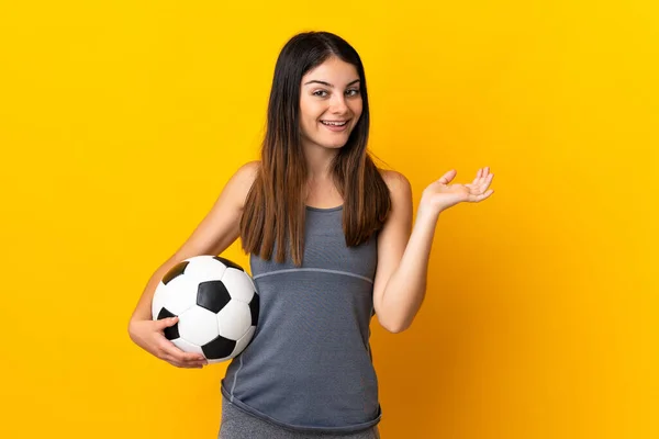 Young Football Player Woman Isolated Yellow Background Shocked Facial Expression — Zdjęcie stockowe