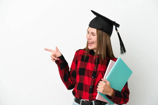 Młoda Angielska Studentka Odizolowana Białym Tle Wskazując Palcem Bok Prezentując — Zdjęcie stockowe